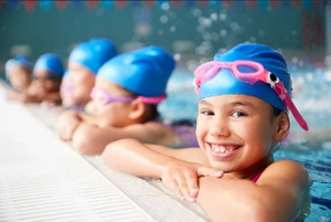 Girl Smiling and Swimming